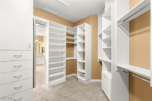 215 Great Gable Dr, Las Vegas, NV 89183 - spacious closet featuring light colored carpet and attic access