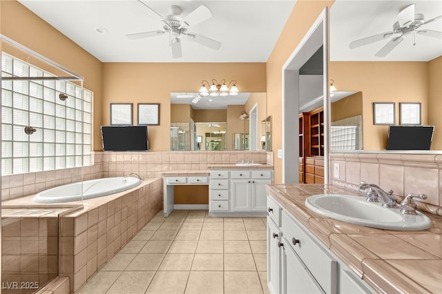 215 Great Gable Dr, Las Vegas, NV 89183 - bathroom with a ceiling fan, a stall shower, tile patterned flooring, and a garden tub