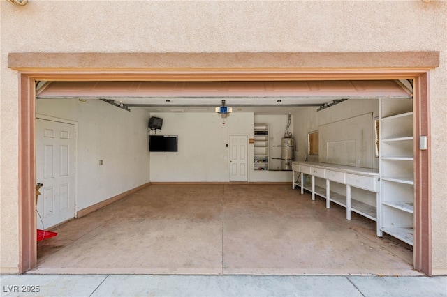 215 Great Gable Dr, Las Vegas, NV 89183 - garage with water heater and baseboards