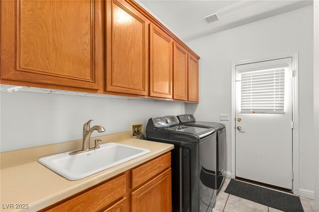 215 Great Gable Dr, Las Vegas, NV 89183 - laundry area with separate washer and dryer, cabinet space, and light tile patterned floors