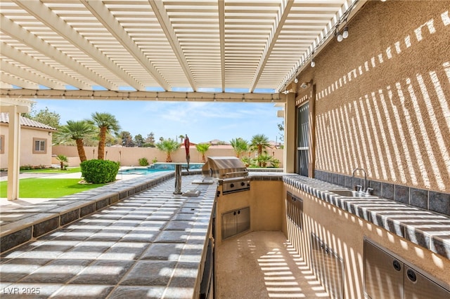 215 Great Gable Dr, Las Vegas, NV 89183 - view of patio / terrace featuring area for grilling, a sink, and a fenced backyard