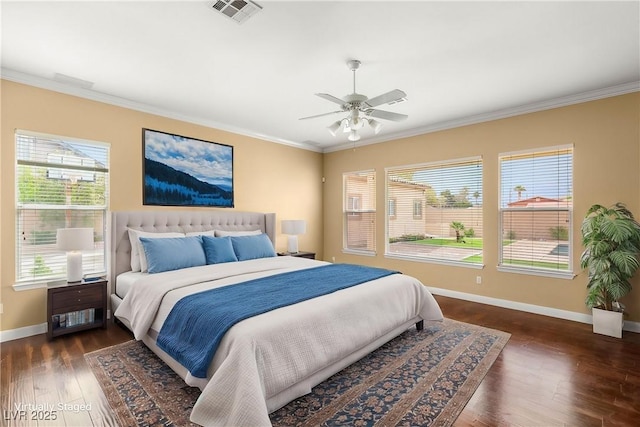 215 Great Gable Dr, Las Vegas, NV 89183 - bedroom with baseboards, crown molding, dark wood-type flooring, and ceiling fan