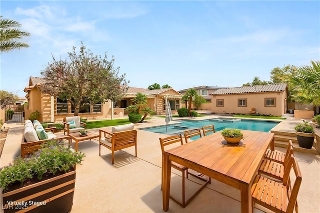 215 Great Gable Dr, Las Vegas, NV 89183 - swimming pool featuring a patio area, an outdoor structure, fence, an outdoor living space, and a storage structure