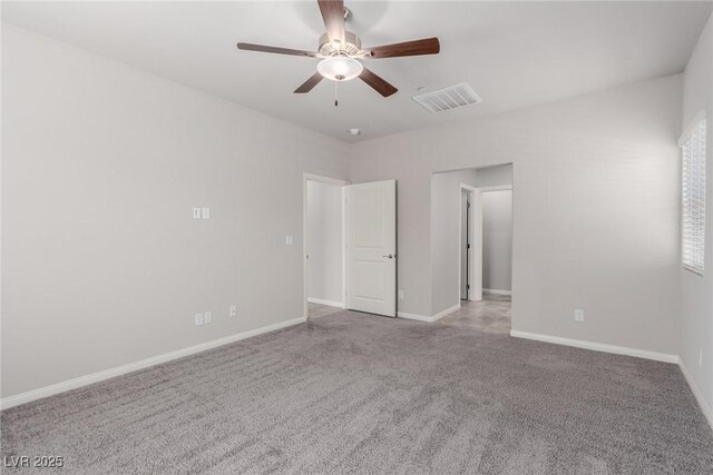 10257 Sequoia Falls Pl, Las Vegas, NV 89149 - unfurnished bedroom with carpet flooring, baseboards, and ceiling fan