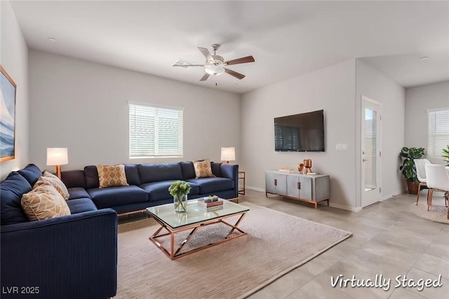 10257 Sequoia Falls Pl, Las Vegas, NV 89149 - living room featuring a ceiling fan and baseboards