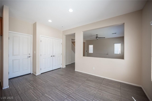 1405 Gilbert Creek Ave, North Las Vegas, NV 89031 - tiled spare room featuring a ceiling fan, baseboards, and recessed lighting