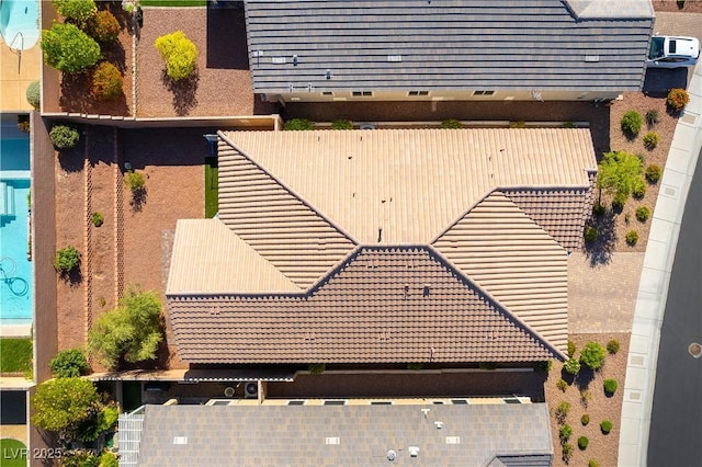 view from above of property with a pool area