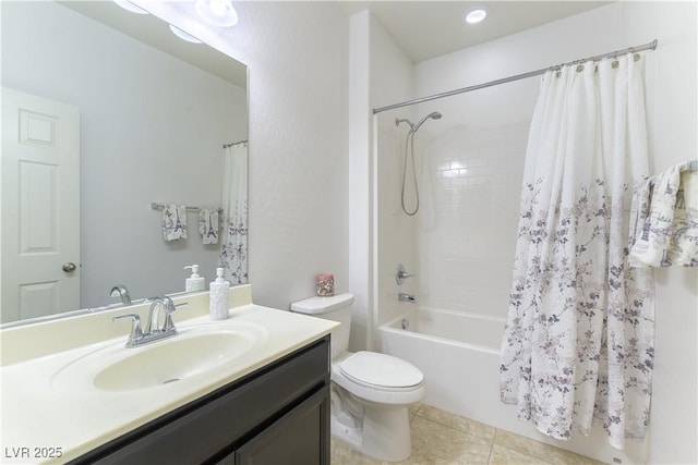 full bath featuring toilet, vanity, tile patterned floors, and shower / tub combo