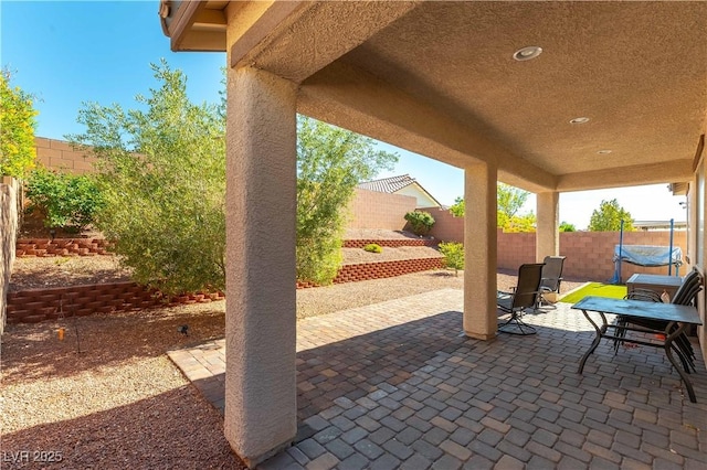 view of patio with a fenced backyard