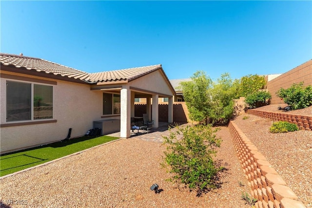 10742 Cowlite Ave, Las Vegas, NV 89166 - fenced backyard featuring a patio area