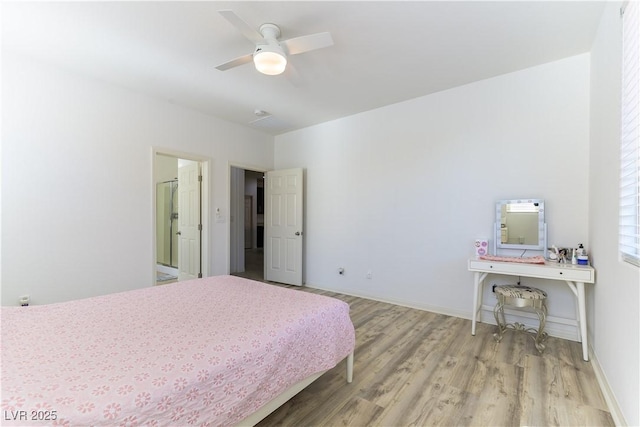 bedroom with light wood-type flooring, ceiling fan, and baseboards