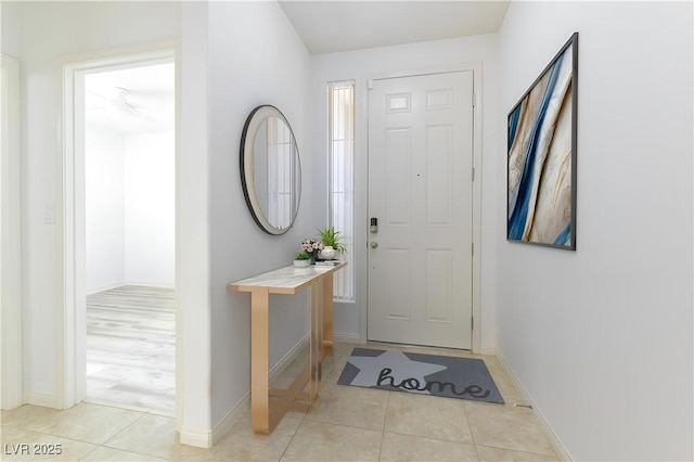 10742 Cowlite Ave, Las Vegas, NV 89166 - foyer featuring tile patterned floors and baseboards