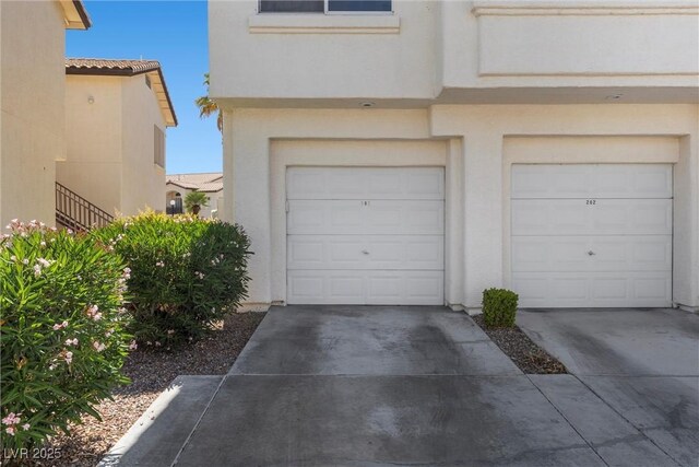 4821 Black Bear Rd Unit 101, Las Vegas, NV 89149 - garage featuring driveway