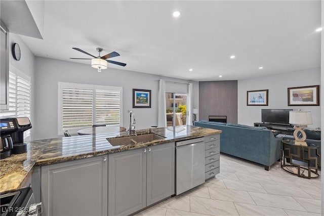 4821 Black Bear Rd Unit 101, Las Vegas, NV 89149 - kitchen with a sink, ceiling fan, plenty of natural light, appliances with stainless steel finishes, and recessed lighting
