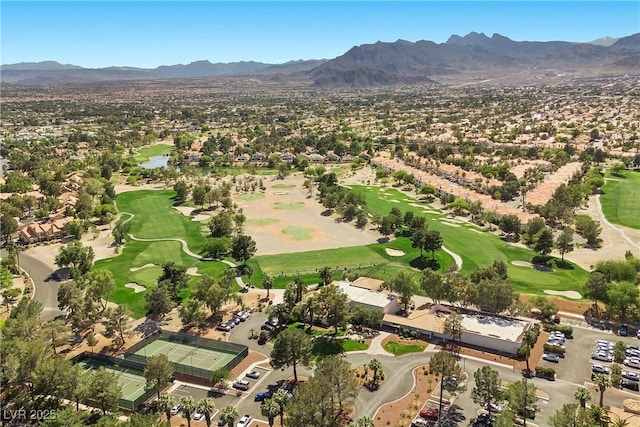 4821 Black Bear Rd Unit 101, Las Vegas, NV 89149 - aerial overview of property's location featuring a golf course, a water and mountain view, and nearby suburban area
