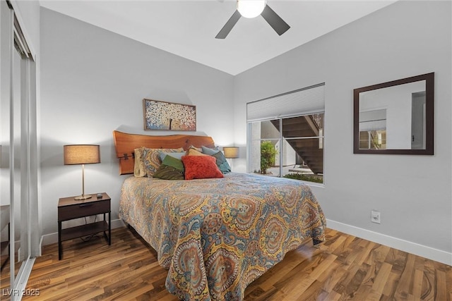 4821 Black Bear Rd Unit 101, Las Vegas, NV 89149 - bedroom featuring wood finished floors, baseboards, vaulted ceiling, and ceiling fan