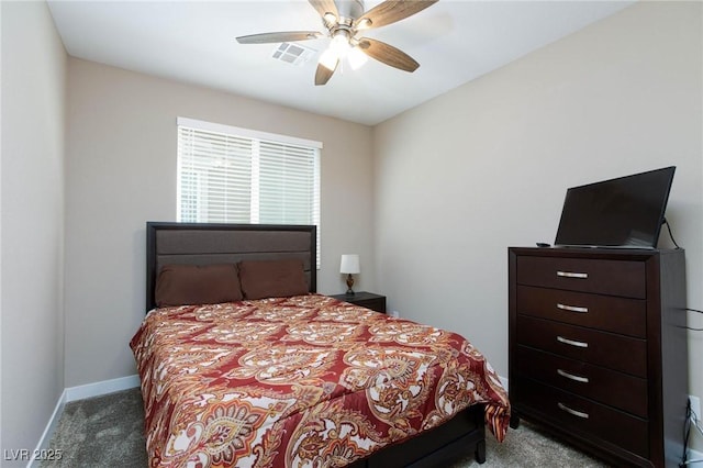 8873 Howell St, Las Vegas, NV 89166 - carpeted bedroom with a ceiling fan and baseboards