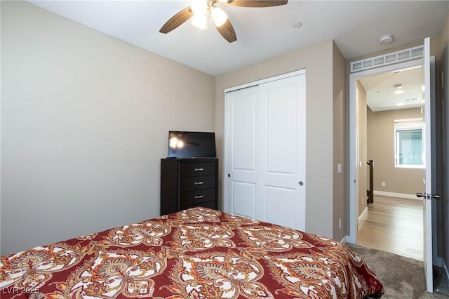 8873 Howell St, Las Vegas, NV 89166 - bedroom featuring a closet, carpet floors, a ceiling fan, and baseboards