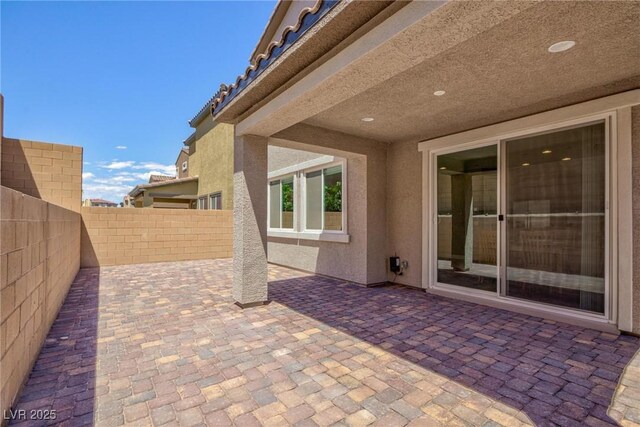 8873 Howell St, Las Vegas, NV 89166 - view of patio / terrace featuring a fenced backyard