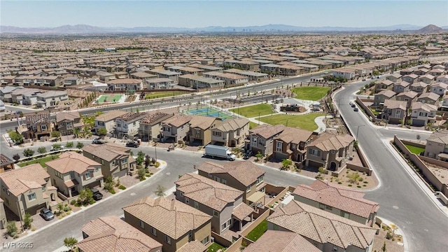 8873 Howell St, Las Vegas, NV 89166 - aerial perspective of suburban area with a mountainous background