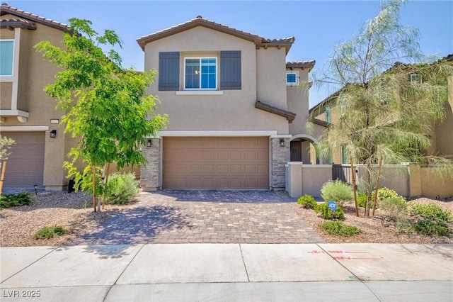 8873 Howell St, Las Vegas, NV 89166 - view of front of property with stucco siding, an attached garage, a tiled roof, and driveway