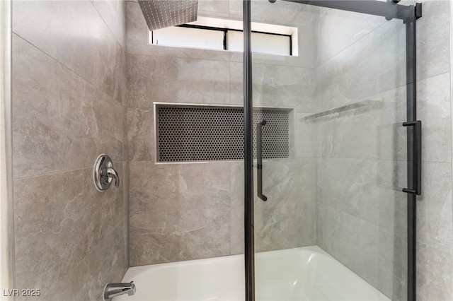 full bathroom with combined bath / shower with glass door