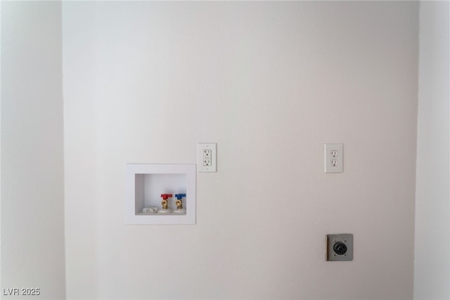 clothes washing area featuring electric dryer hookup and hookup for a washing machine