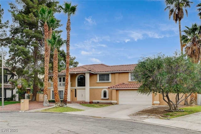 2224 Lucerne Ct, Henderson, NV 89014 - mediterranean / spanish-style home with driveway, a tiled roof, stucco siding, and a garage