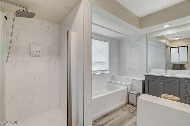 2224 Lucerne Ct, Henderson, NV 89014 - bathroom featuring a marble finish shower, a bath, wood finished floors, and vanity