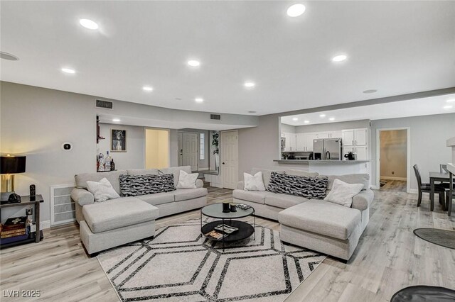 2224 Lucerne Ct, Henderson, NV 89014 - living area featuring baseboards, recessed lighting, and light wood-type flooring