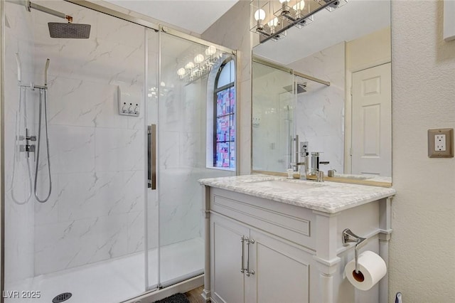2224 Lucerne Ct, Henderson, NV 89014 - full bathroom with a marble finish shower, vanity, a textured wall, and a chandelier