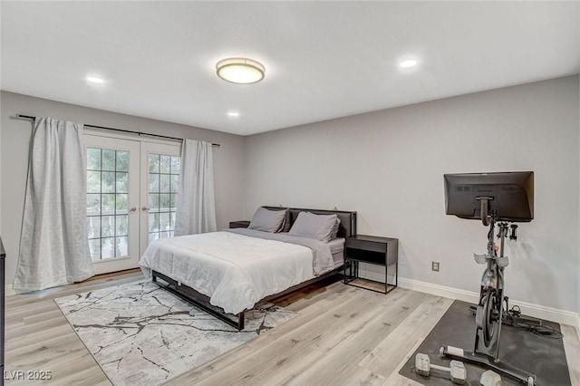 2224 Lucerne Ct, Henderson, NV 89014 - bedroom with french doors, wood finished floors, baseboards, and recessed lighting