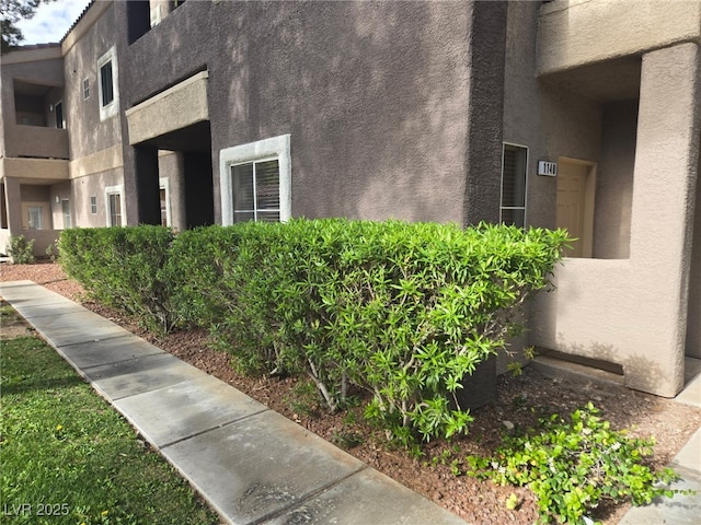 view of home's exterior with stucco siding
