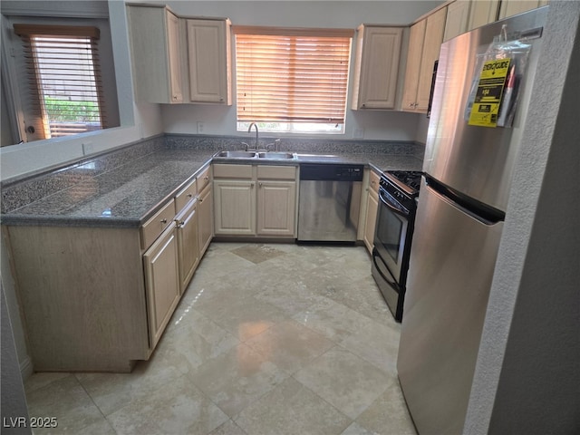 kitchen featuring stainless steel appliances and a sink
