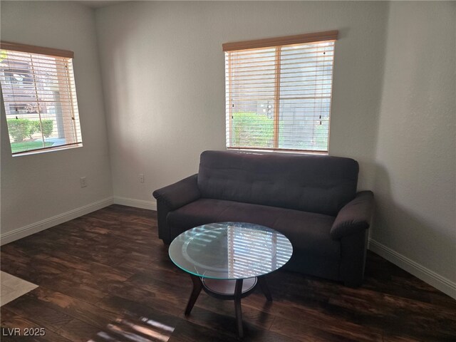 sitting room featuring wood finished floors and baseboards