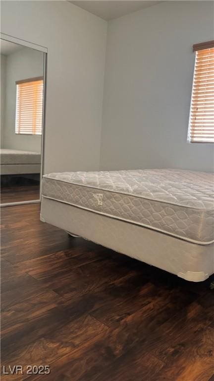 bedroom featuring wood finished floors