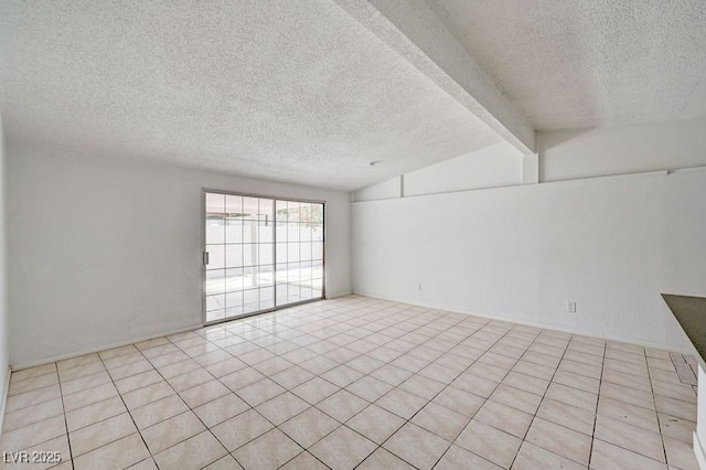 unfurnished room featuring a textured ceiling