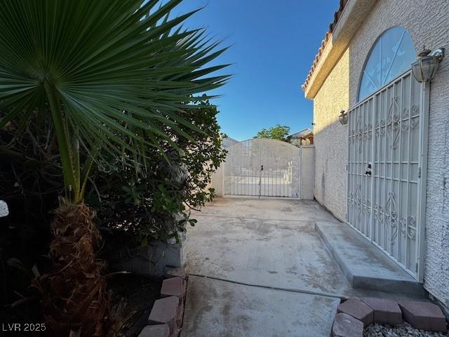 529 Rancho Del Mar Way N, Las Vegas, NV 89031 - view of patio with a gate