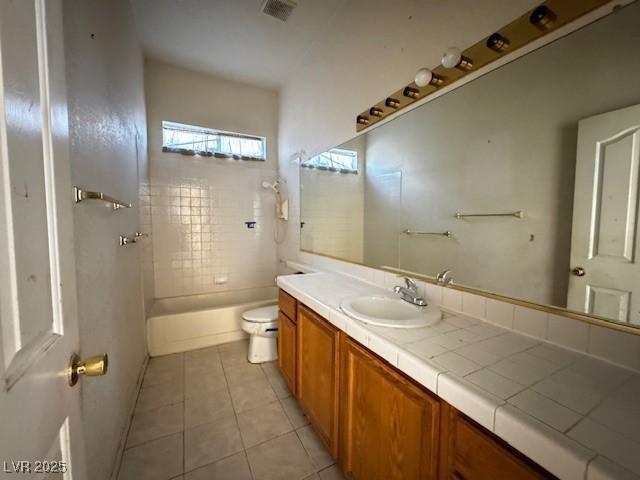 529 Rancho Del Mar Way N, Las Vegas, NV 89031 - bathroom featuring toilet, vanity, and tile patterned flooring