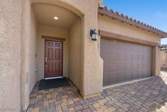 3708 Fuselier Dr, North Las Vegas, NV 89032 - view of exterior entry with stucco siding and driveway