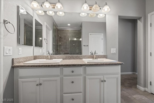 3708 Fuselier Dr, North Las Vegas, NV 89032 - full bathroom featuring a stall shower, double vanity, tile patterned flooring, and baseboards