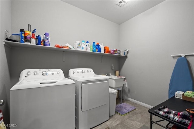 3708 Fuselier Dr, North Las Vegas, NV 89032 - laundry room with independent washer and dryer and baseboards