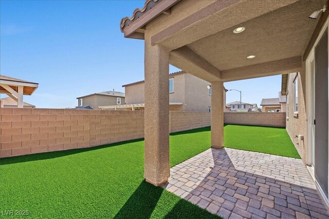 3708 Fuselier Dr, North Las Vegas, NV 89032 - fenced backyard featuring a patio area