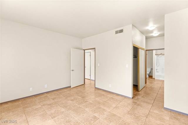 4830 Grey Wolf Ln Unit 104, Las Vegas, NV 89149 - unfurnished bedroom with baseboards and a closet