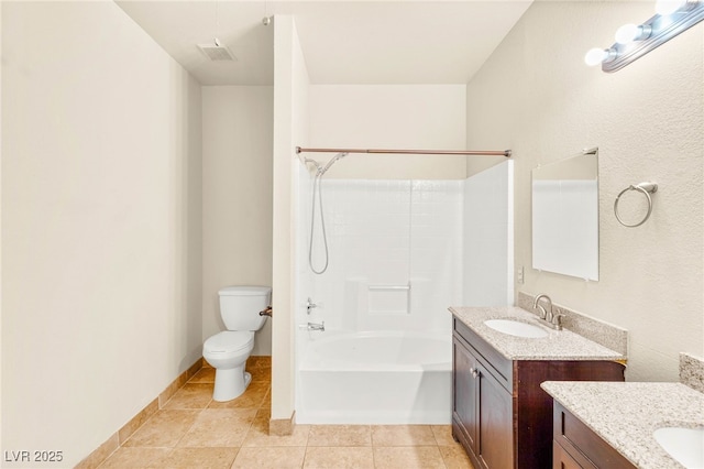 4830 Grey Wolf Ln Unit 104, Las Vegas, NV 89149 - bathroom with toilet, two vanities, shower / bathtub combination, and tile patterned flooring