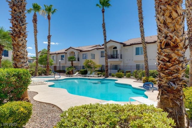 4830 Grey Wolf Ln Unit 104, Las Vegas, NV 89149 - community pool with fence and a patio