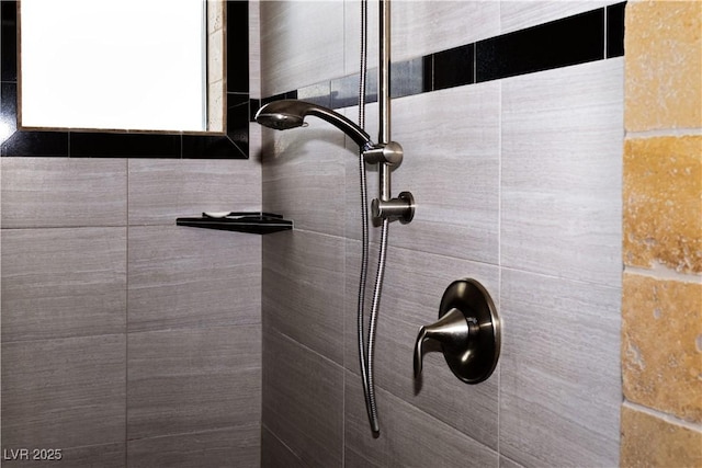bathroom view of tiled shower