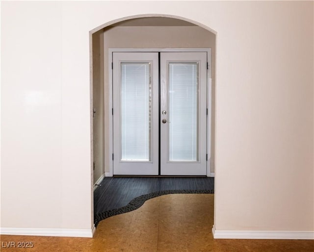 2822 La Palma Dr, Laughlin, NV 89029 - spare room with baseboards, french doors, and arched walkways