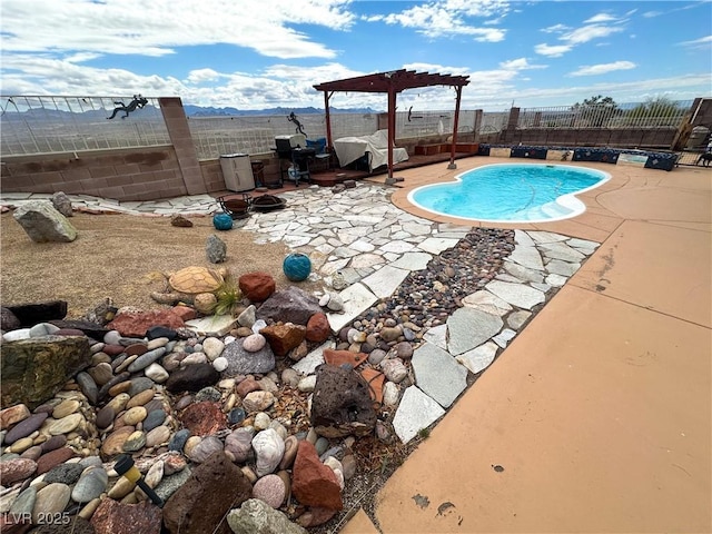 view of pool featuring a fenced backyard and a patio area