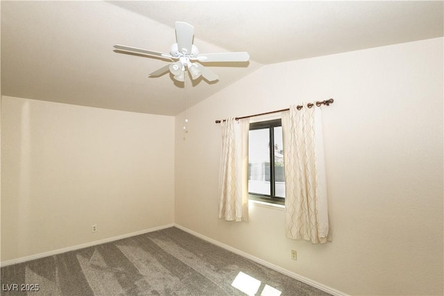 2822 La Palma Dr, Laughlin, NV 89029 - unfurnished room with a ceiling fan, vaulted ceiling, baseboards, and carpet